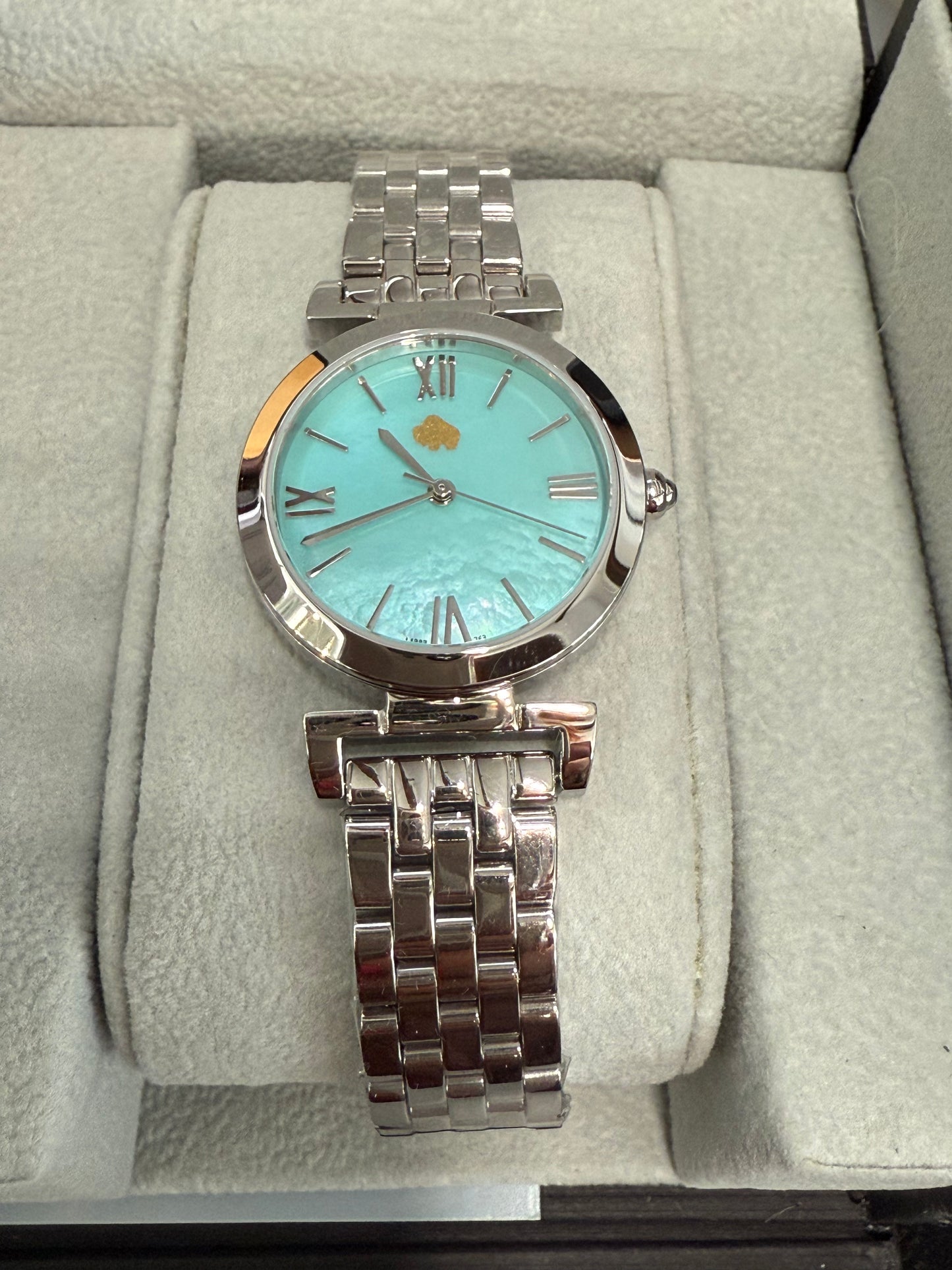 Golden Buffalo Women's Silver Tone Stainless Steel Watch with Turquoise Mother of Pearl Dial