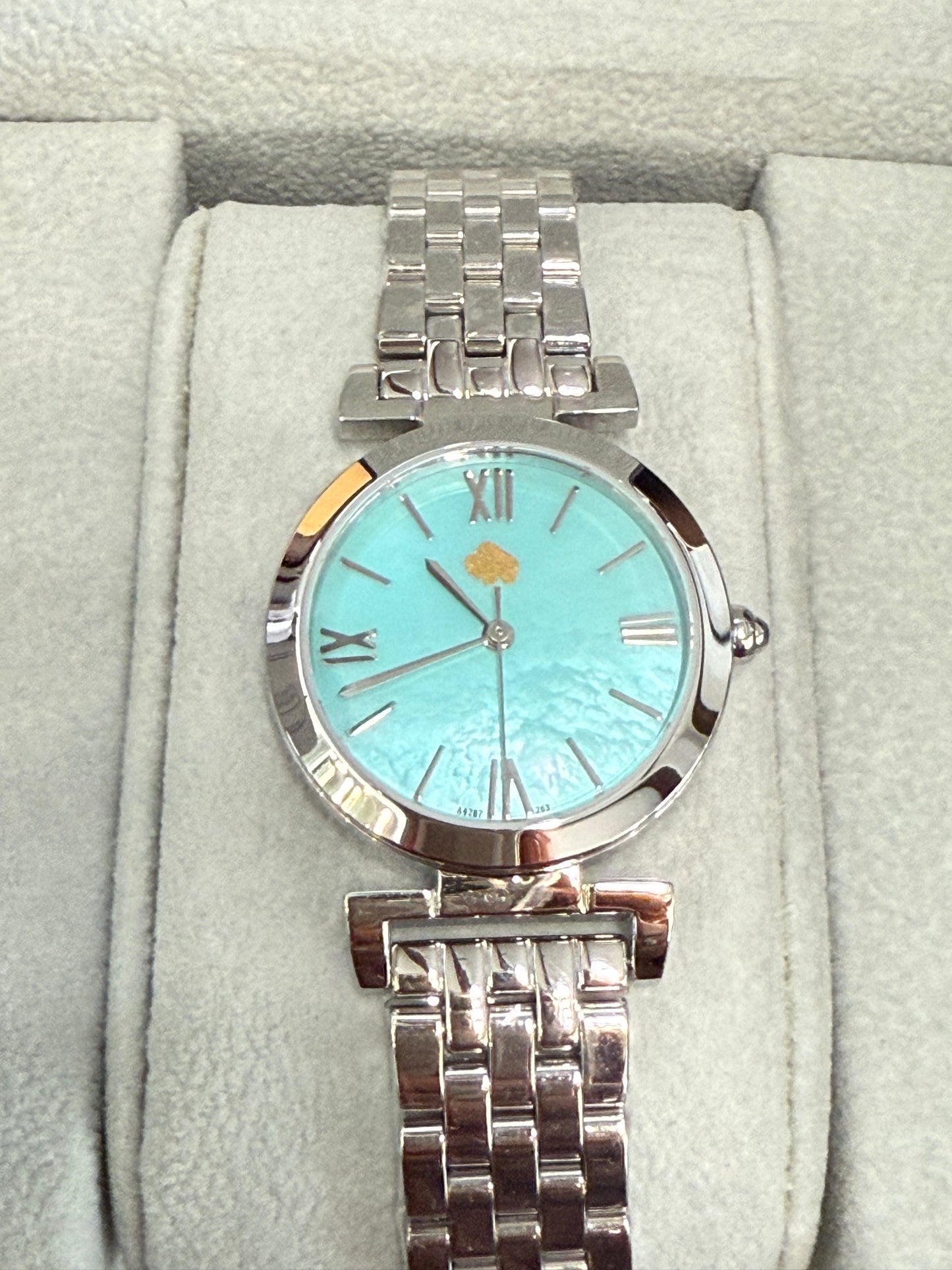 Golden Buffalo Women's Silver Tone Stainless Steel Watch with Turquoise Mother of Pearl Dial